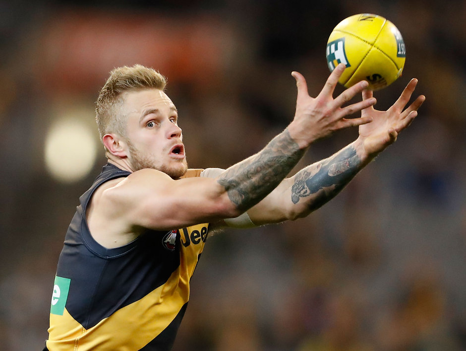 AFL 2016 Rd 12 - Richmond v Gold Coast MELBOURNE, AUSTRALIA - JUNE 12: Brandon Ellis of the Tigers marks the ball during the 2016 AFL Round 12 match between the Richmond Tigers and the Gold Coast Suns at the Melbourne Cricket Ground on June 12, 2016 in Melbourne, Australia. (Photo by Adam Trafford/AFL Media)